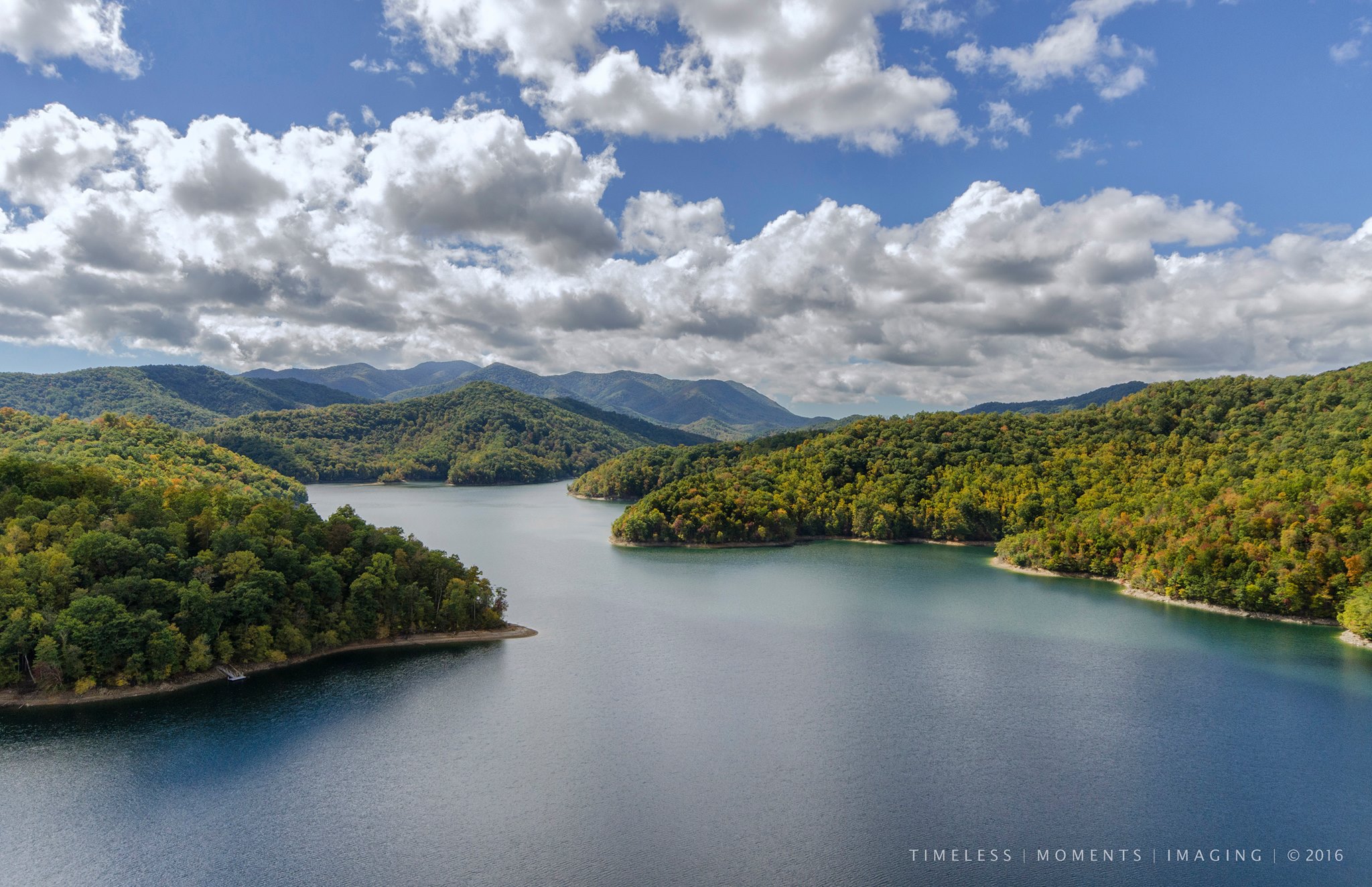 Sparkling waters of Nantahala Lake surrounded by the Smoky Mountains of Western North Carolina on a beautiful early autumn day